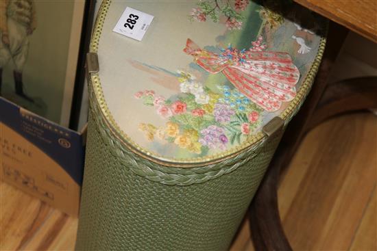 A 1920s Lloyd Loom style box with embroidered top